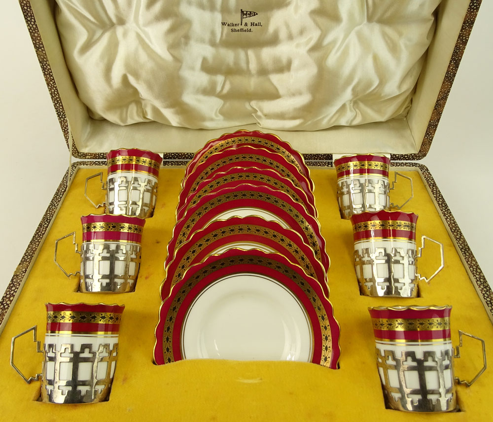 Set of 6 Mid 20th Century Aynsley Porcelain Demitasse Cups in Sterling Silver Holders with Saucers In Original Fitted Faux Shagreen Covered Case.