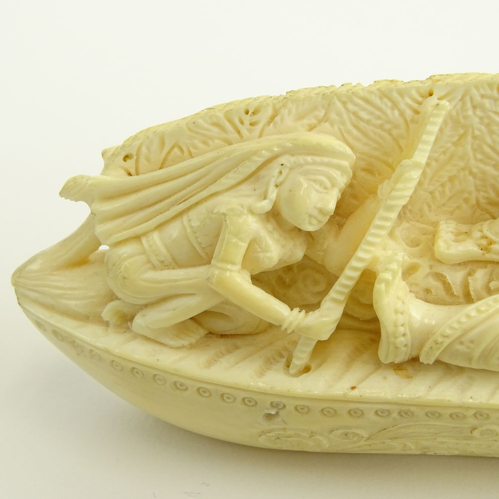 Heavy Vintage Indian Ivory Carving Depicting a Canoe With Figures.