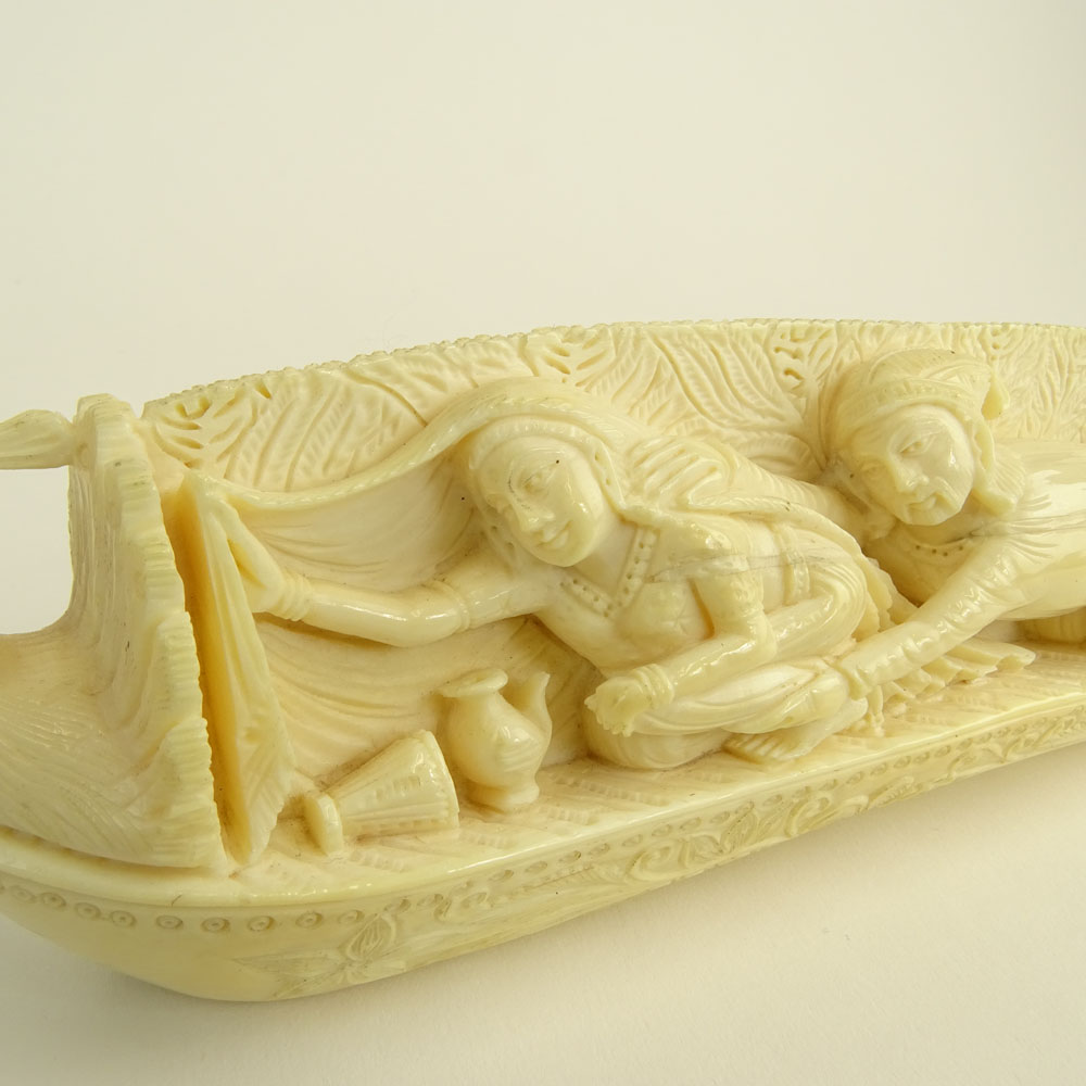 Heavy Vintage Indian Ivory Carving Depicting a Canoe With Figures.