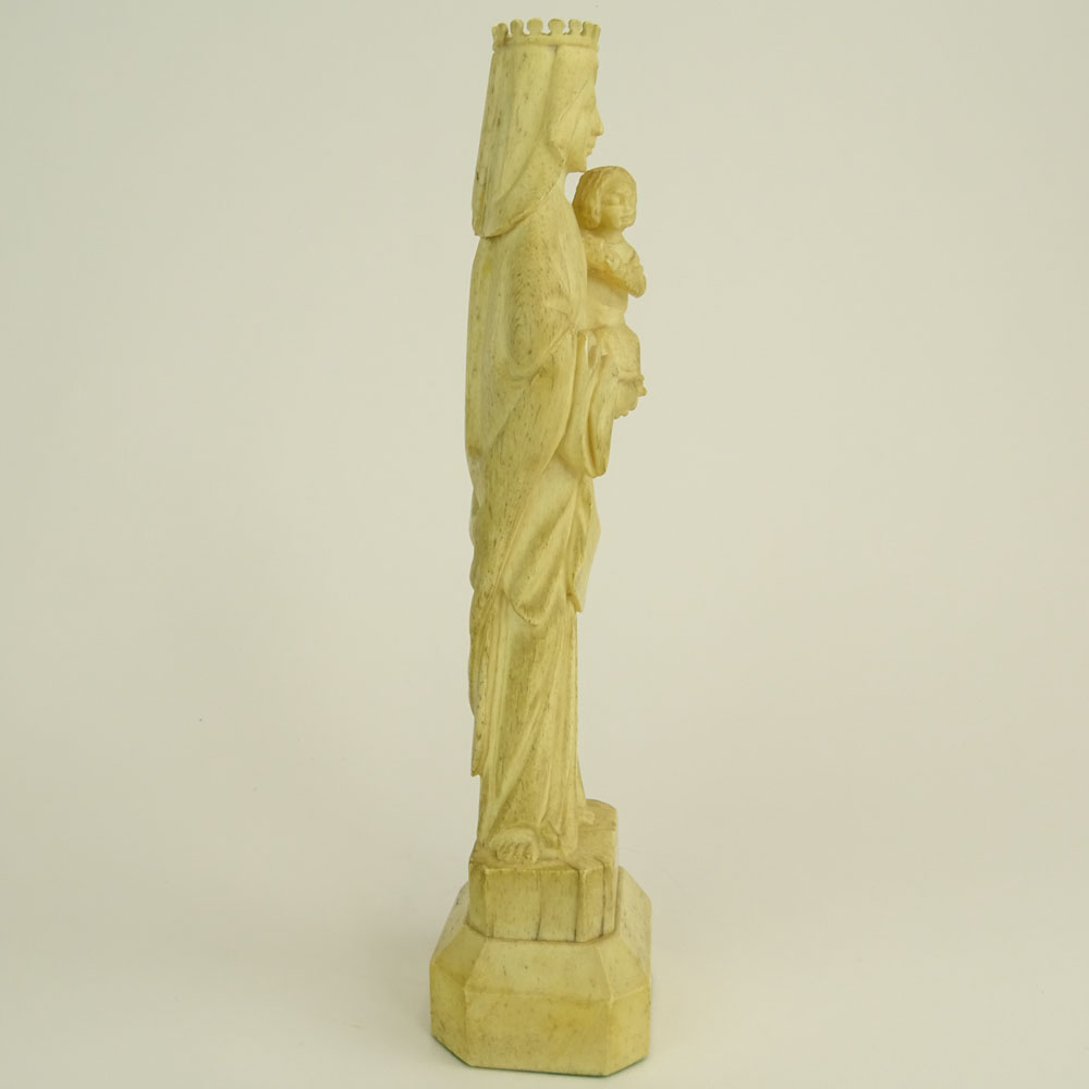 Antique Continental Carved Bone Figure of Madonna and Child.