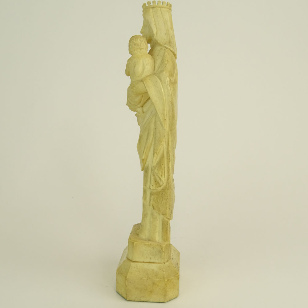 Antique Continental Carved Bone Figure of Madonna and Child.