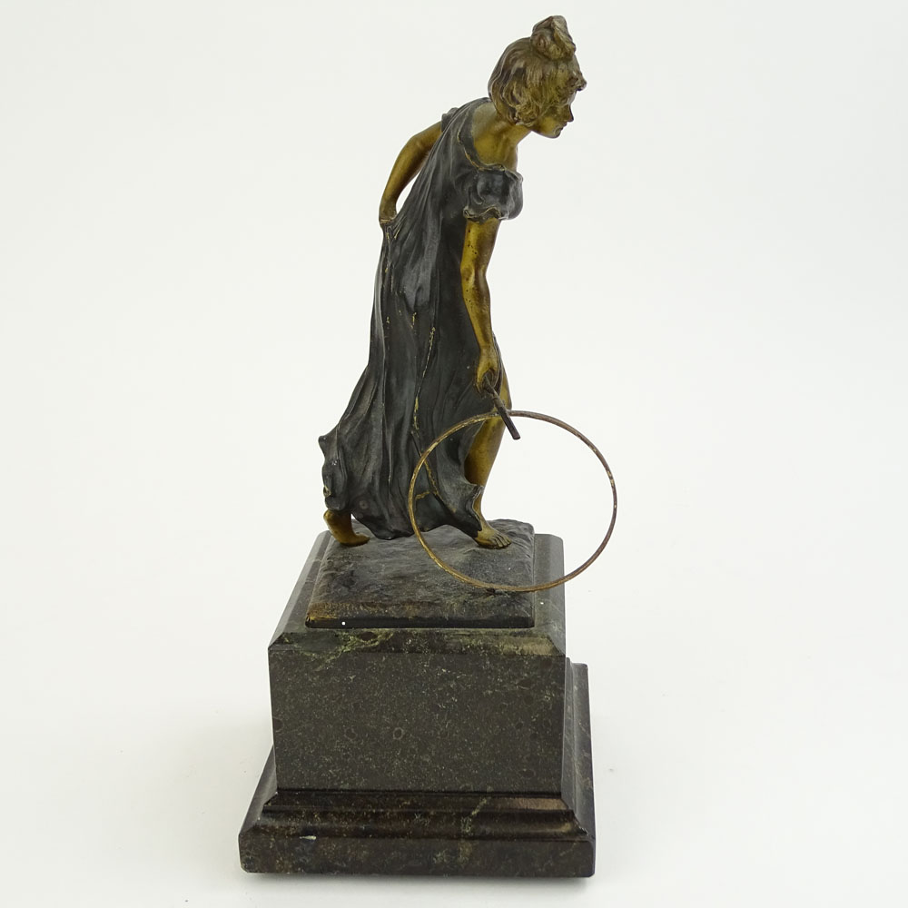 Paolo Ferrari, Italian (19/20th C) Patinated bronze sculpture on marble base "Girl With Hoop" 