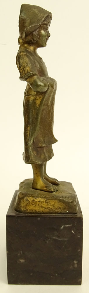 Spiro Schwalenberg, German (19/20th) Bronze figure of a girl golden-brown patinated. 