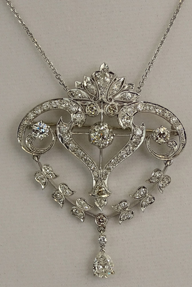 Art Deco Approx. 5.50 Carat Diamond and Platinum Pendant/Brooch with 14 Karat White Gold Chain.