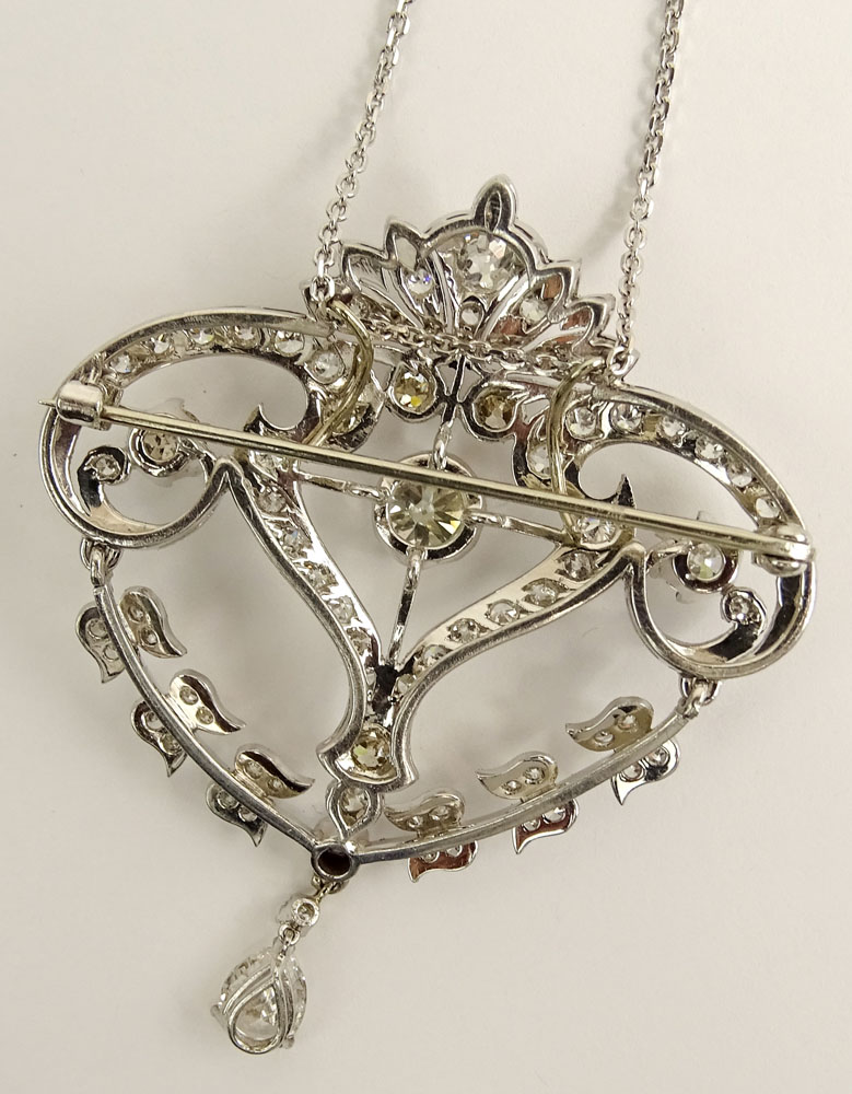 Art Deco Approx. 5.50 Carat Diamond and Platinum Pendant/Brooch with 14 Karat White Gold Chain.