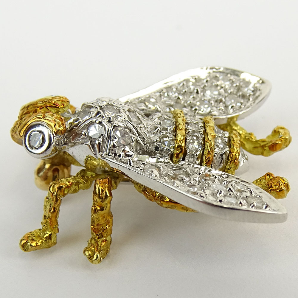 Vintage Round Cut Diamond and 18 Karat Yellow and White Gold Fly Brooch.