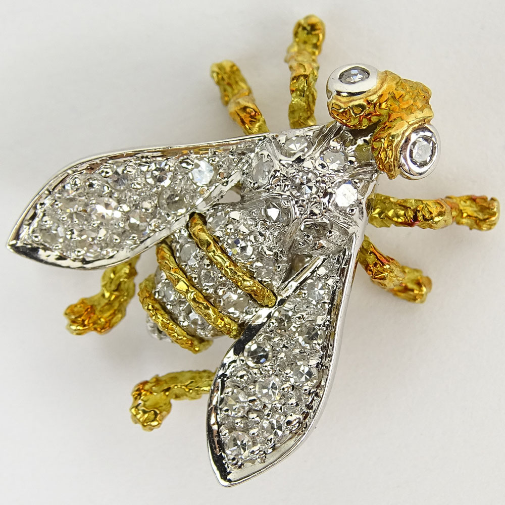 Vintage Round Cut Diamond and 18 Karat Yellow and White Gold Fly Brooch.