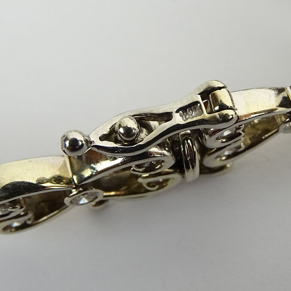 Lady's Diamond and 14 Karat White Gold Bracelet. Signed 14K.