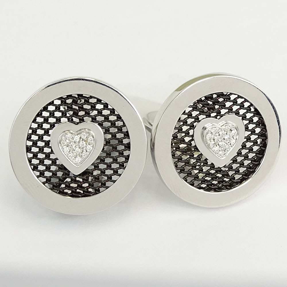 Sabbadini Milano .15 Carat Round Cut Diamond, 18 Karat White Gold and Stainless Steel Earrings. 