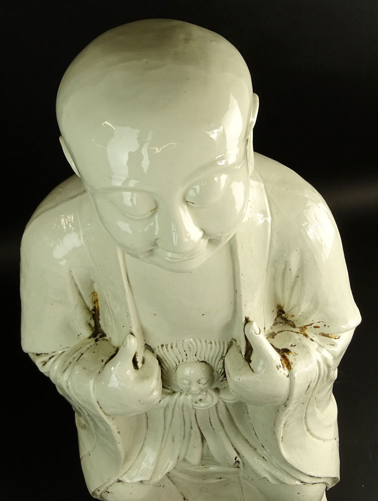 Large Antique Chinese Blanc de Chine Figure of a Monk.