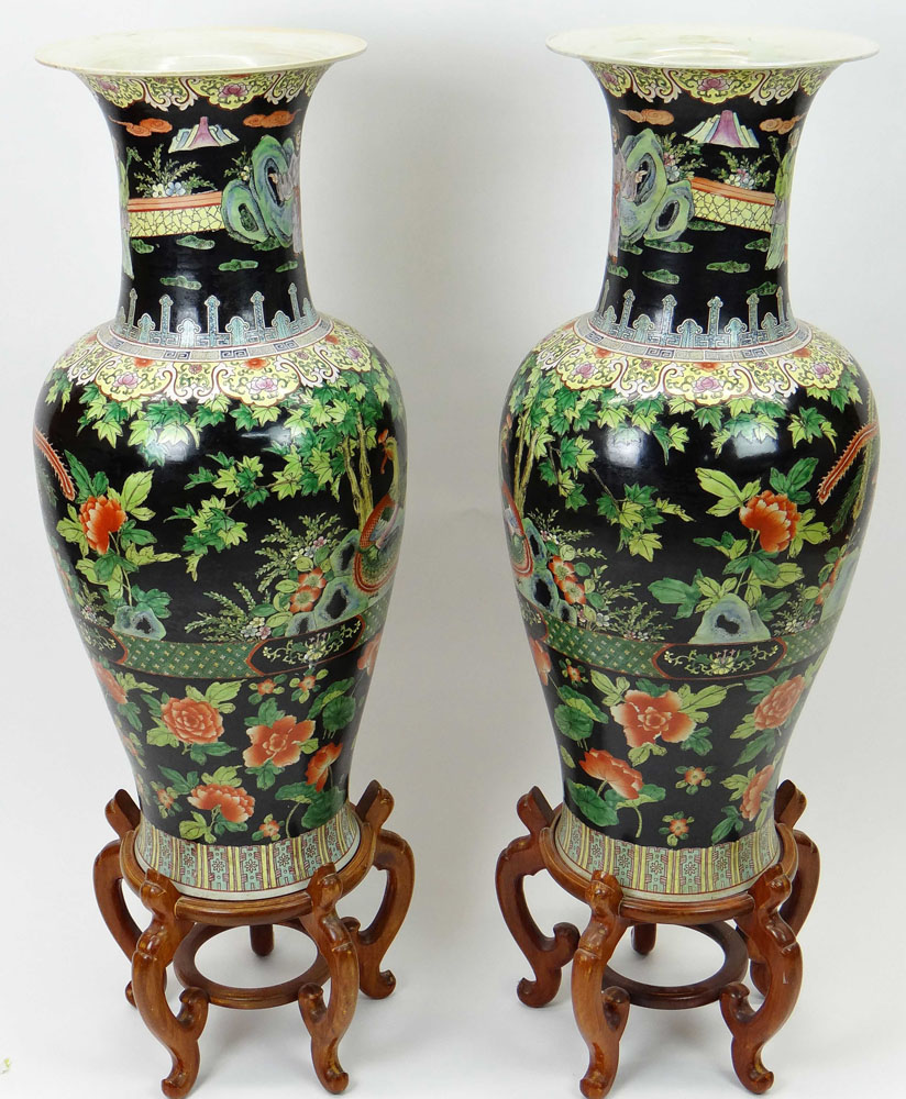 Large Pair of Chinese Famille Noir Baluster Vases with Wood Stands.