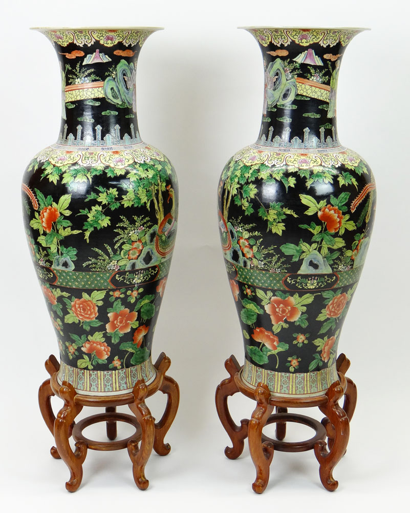 Large Pair of Chinese Famille Noir Baluster Vases with Wood Stands.