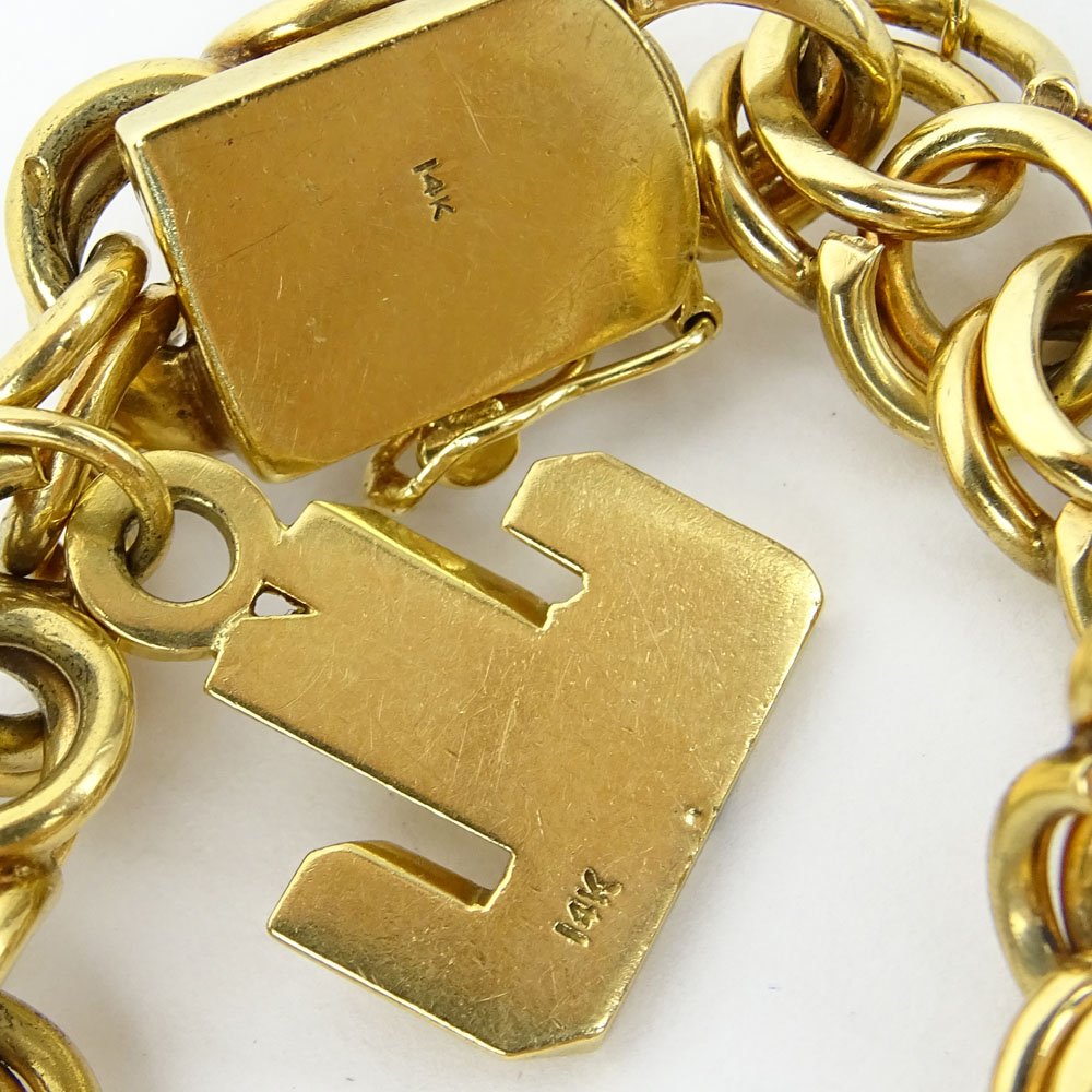 Vintage Thick and Heavy 14 Karat Yellow Gold Charm  Bracelet with One (1) Charm "JL". 