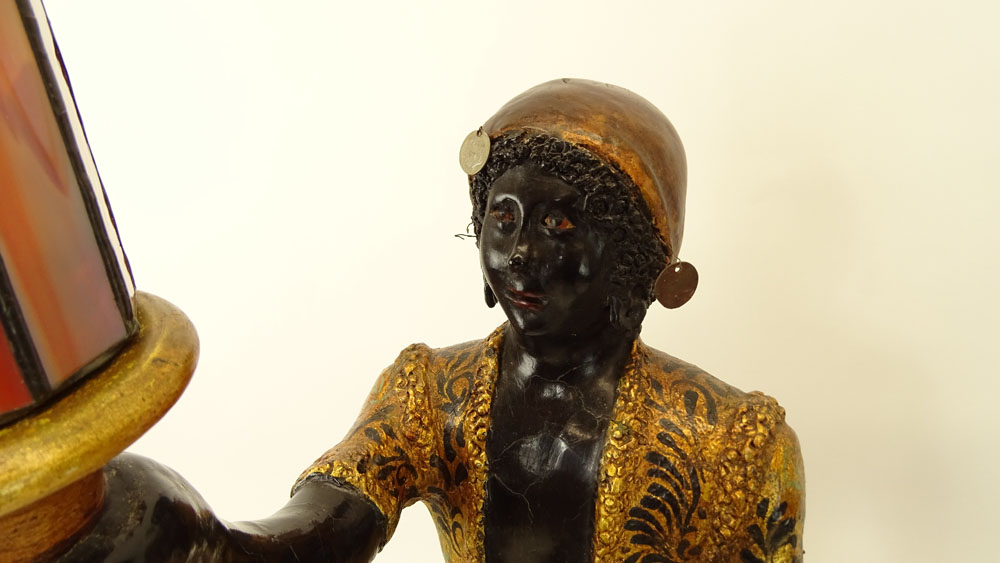 Pair of Early to Mid 20th Century Venetian style Carved Painted and Parcel Gilt Blackamoor Gondolier Figures on Bases.