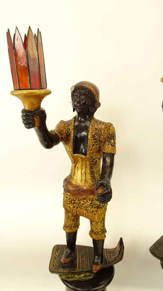 Pair of Early to Mid 20th Century Venetian style Carved Painted and Parcel Gilt Blackamoor Gondolier Figures on Bases.