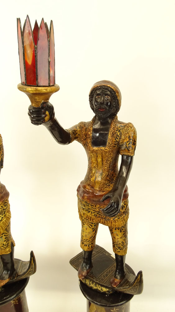 Pair of Early to Mid 20th Century Venetian style Carved Painted and Parcel Gilt Blackamoor Gondolier Figures on Bases.