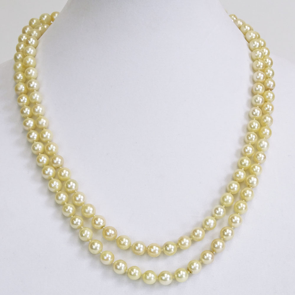 Vintage 9.00 mm White Pearl Double Strand Necklace with 14 Karat Gold and Diamond Clasp.