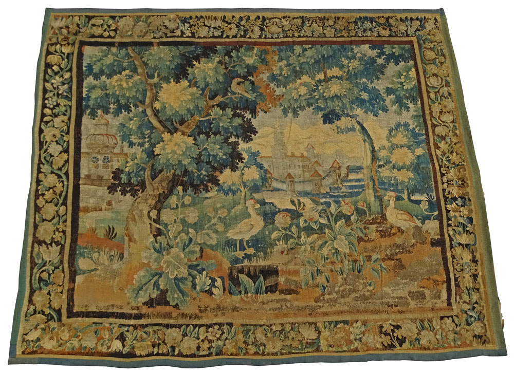 Large 17/18th Century Flemish Tapestry. Scene depicting a tree in landscape with buildings and animals. Lined.