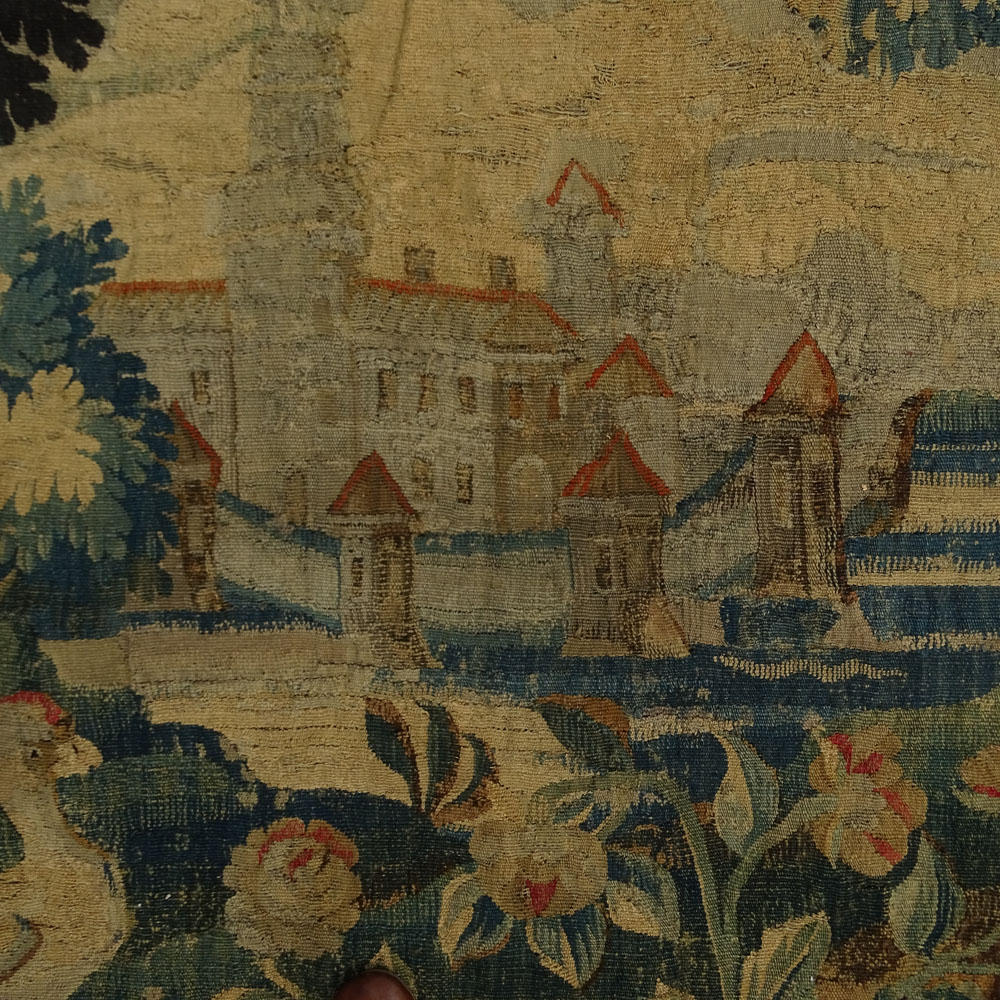 Large 17/18th Century Flemish Tapestry. Scene depicting a tree in landscape with buildings and animals. Lined.