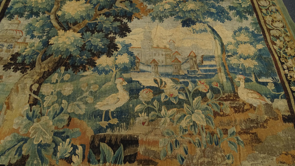 Large 17/18th Century Flemish Tapestry. Scene depicting a tree in landscape with buildings and animals. Lined.
