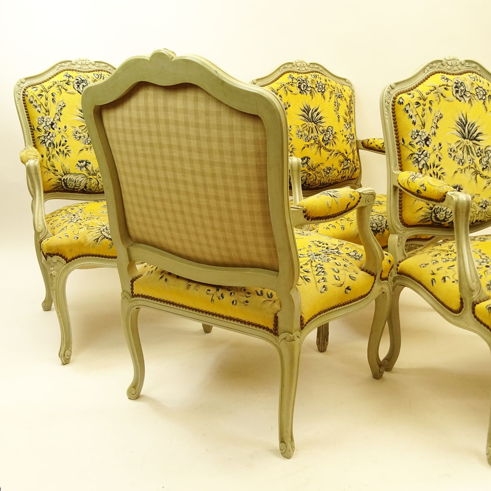 Set of Four (4) 19th Century French Louis XV style Carved and Painted Fauteuils with Petit Point Upholstery.