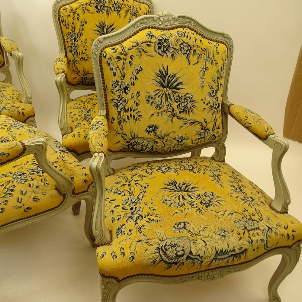 Set of Four (4) 19th Century French Louis XV style Carved and Painted Fauteuils with Petit Point Upholstery.