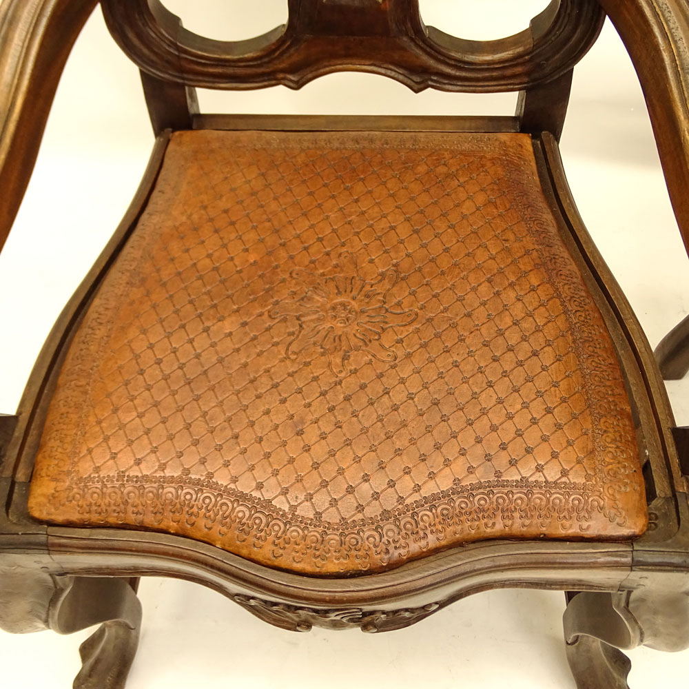 Pair of 20th Century Brazilian Portuguese Style Carved Wood and Tooled Leather Arm Chairs.