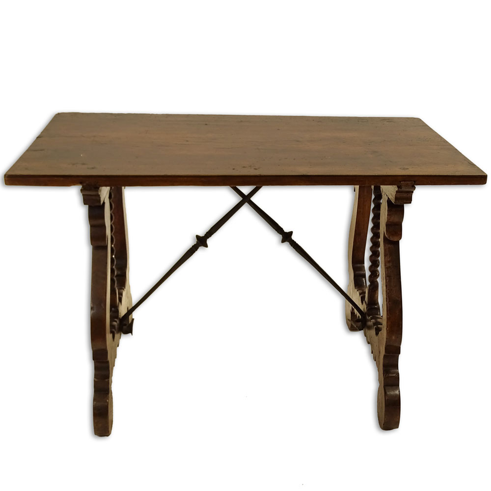 19th Century Italian Walnut Trestle Table. Comprised of a single plank on harp legs with iron stretchers.