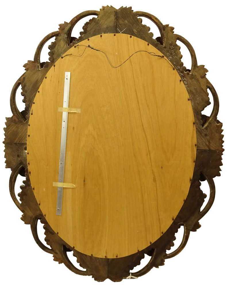 Large Early 20th Century Italian Carved and Parcel Gilt Mirror With Grape Motif.