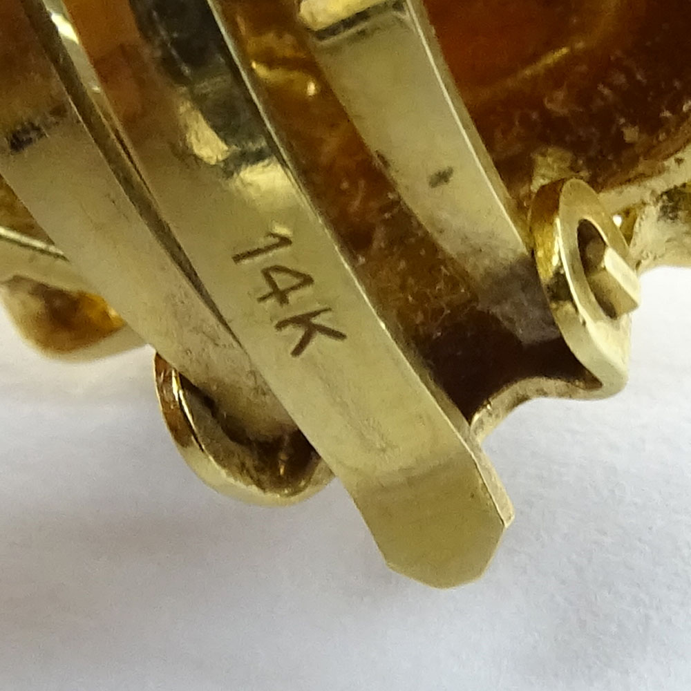 Vintage 14 Karat Yellow Gold Button style earrings. Signed 14K.
