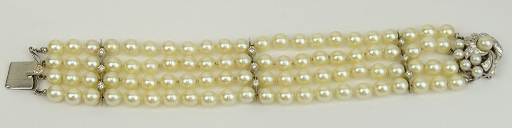 Vintage Four Strand Pearl, Diamond and 14 Karat White Gold Bracelet. 