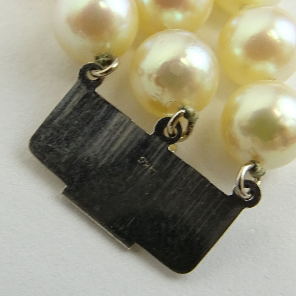 Vintage Three Strand Pearl and 14 Karat White Gold Bracelet.