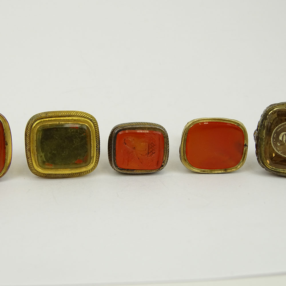 Collection of Seven (7) Antique Gold Filled Charms, Four with inset Carnelian