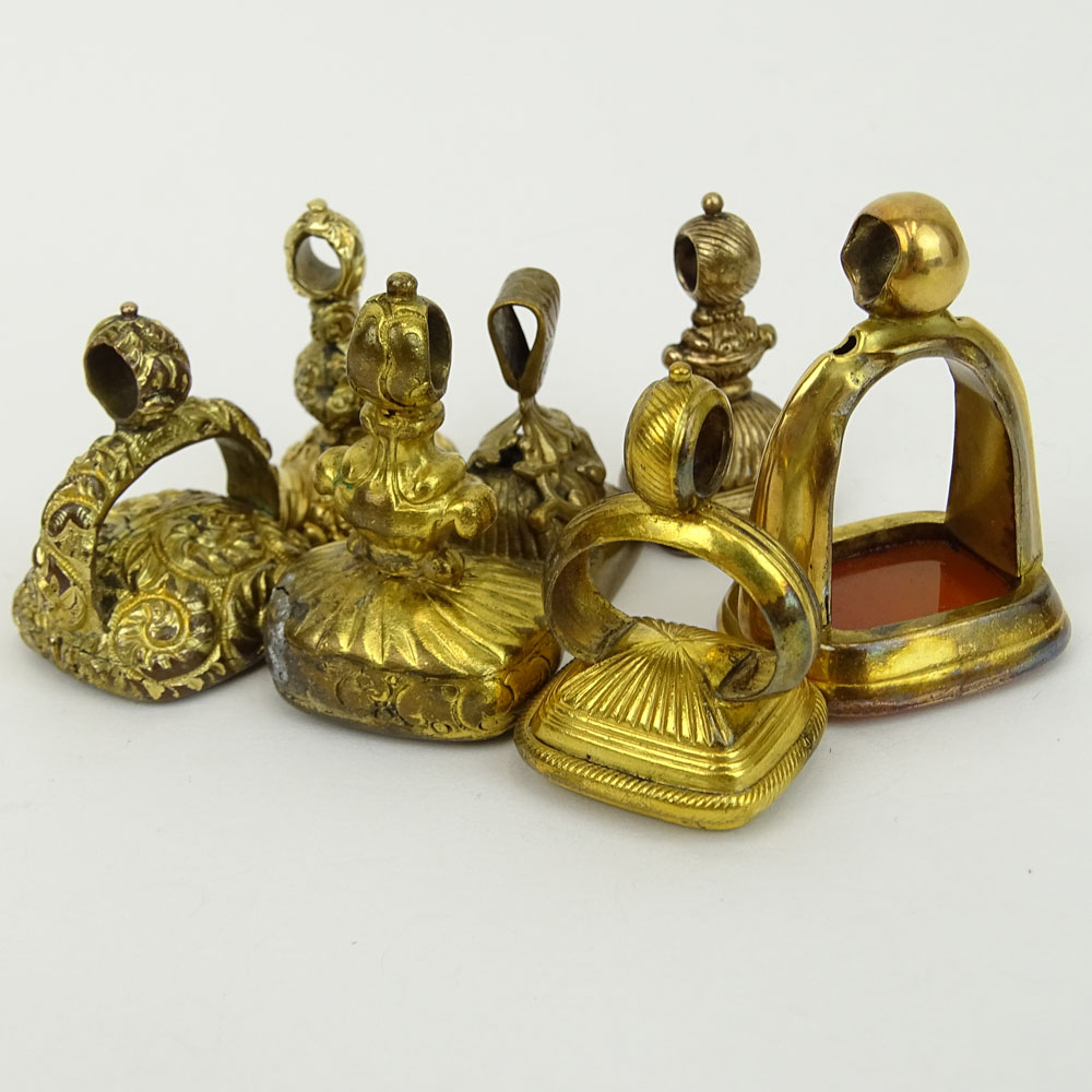 Collection of Seven (7) Antique Gold Filled Charms, Four with inset Carnelian