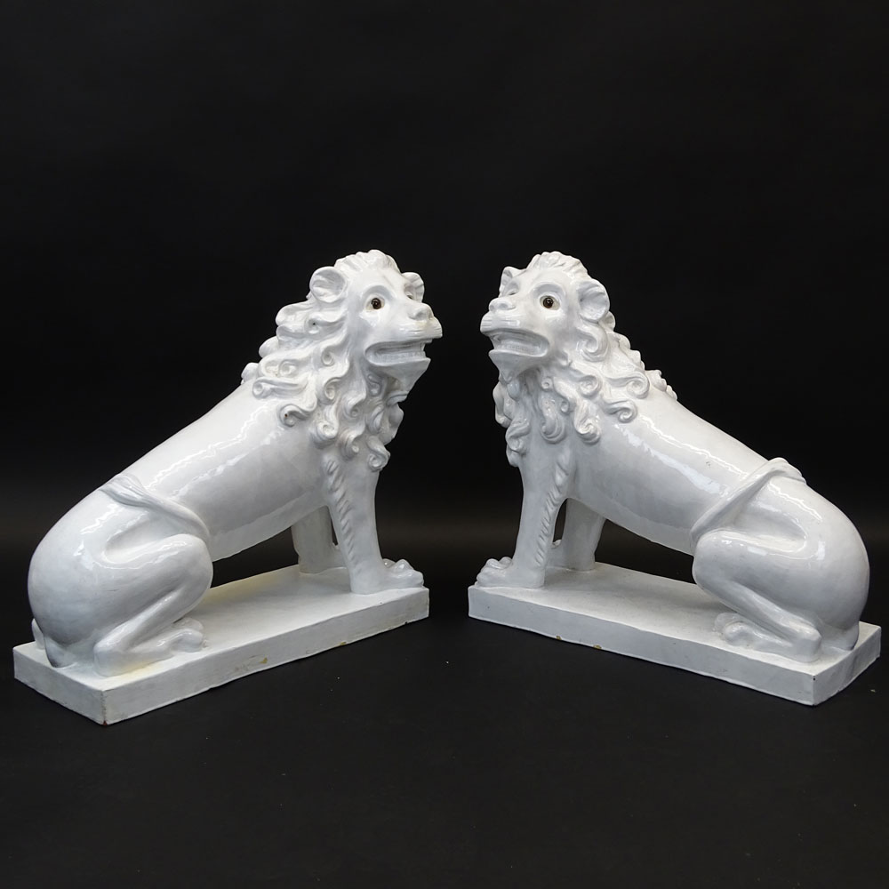 Pair of Large Vintage French White Glazed Faience Lions With Glass Eyes.