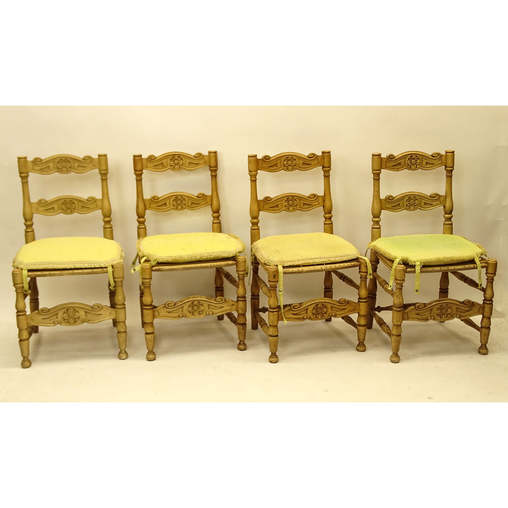 Set of Seventeen (17) Mid 20th Century Country French Style Carved Wood Chairs with Fortuny Cushions.