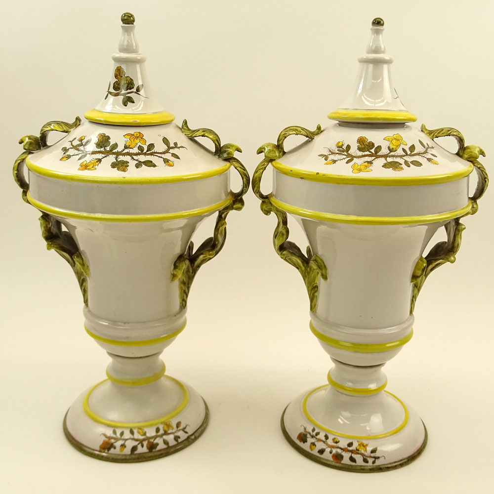 Pair of Large Italian Majolica Handled Urns. Hand painted Floral Motif.