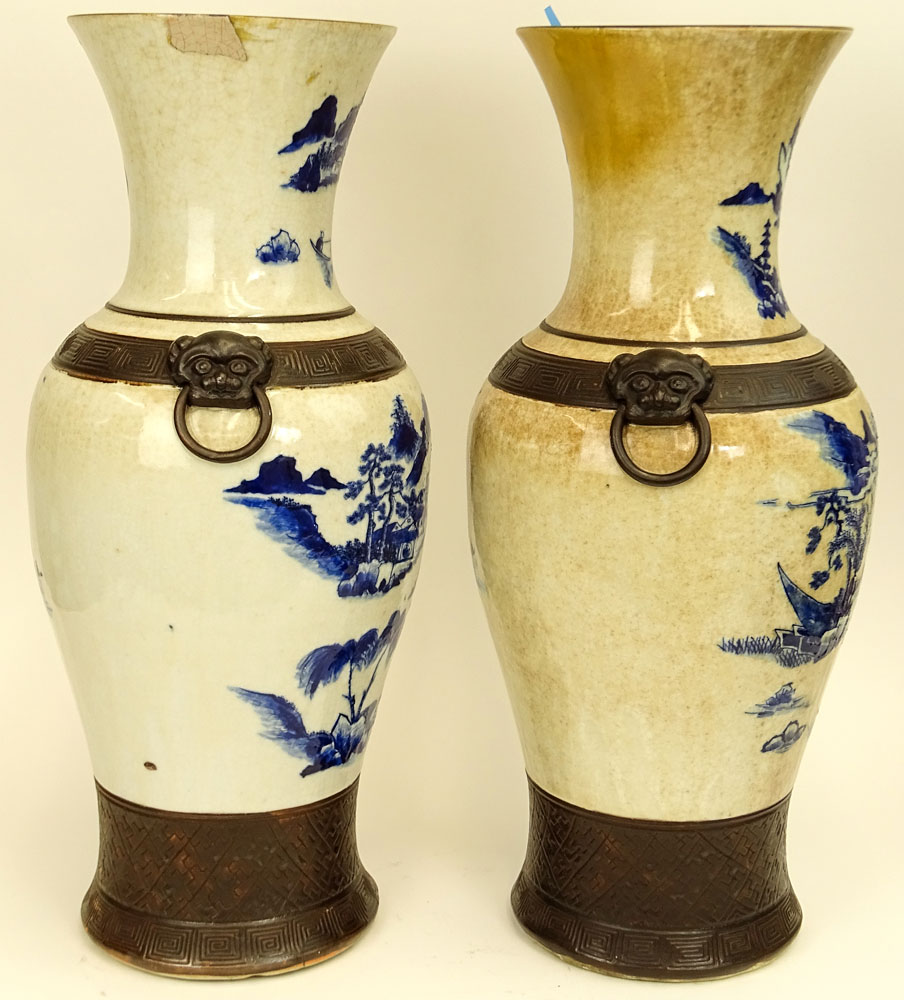 20th Century Chinese Guangxu style pottery vases with raised enamel foot, bands and mock figural ring handles. 