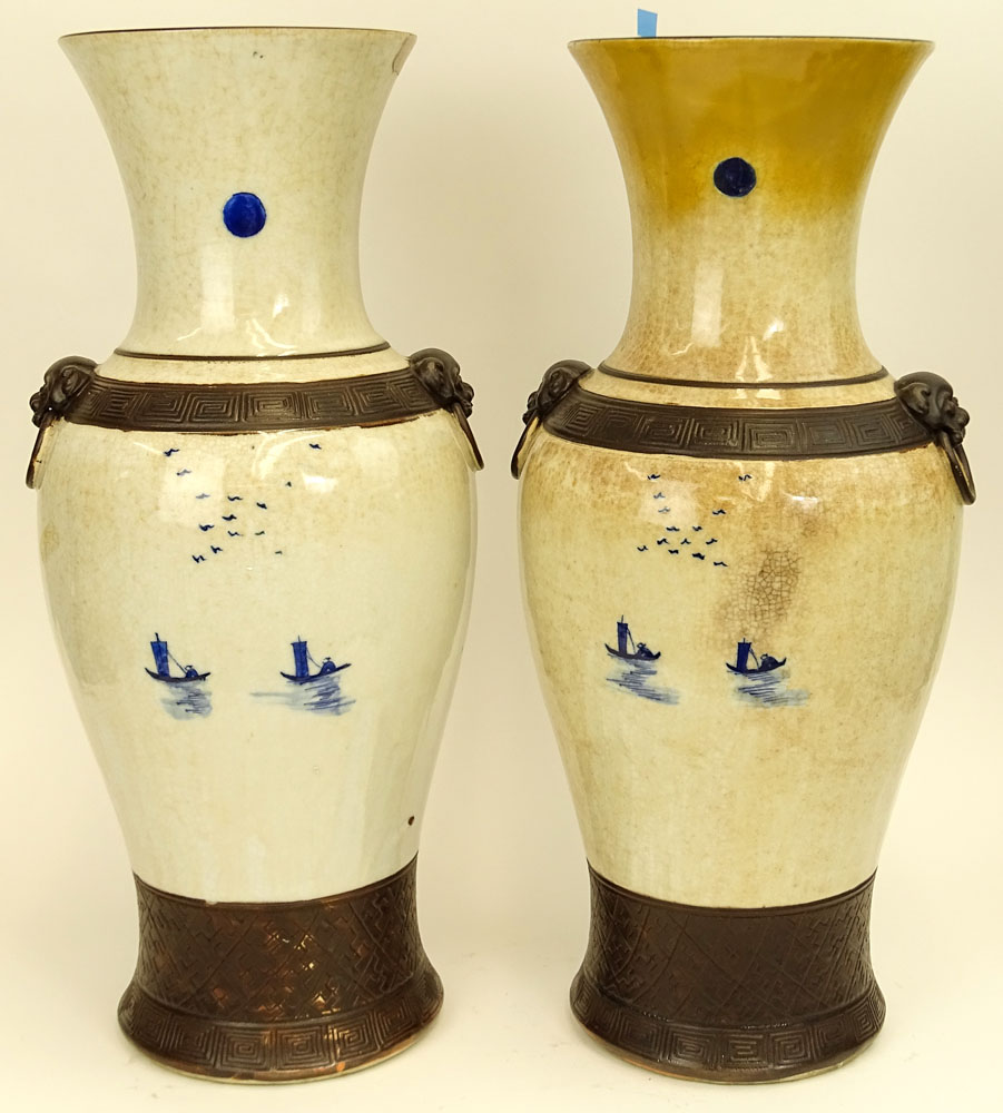 20th Century Chinese Guangxu style pottery vases with raised enamel foot, bands and mock figural ring handles. 