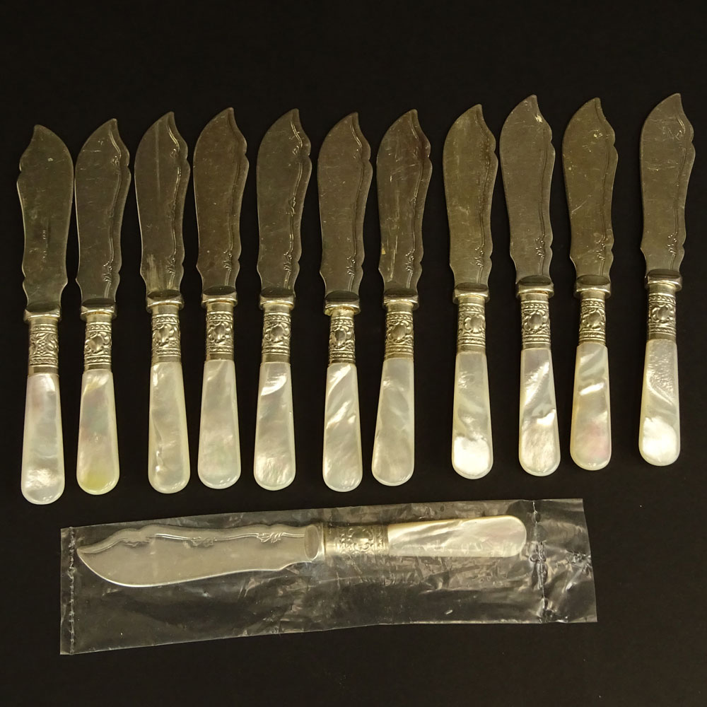 Twelve (12) Vintage Sheffield Silver Plate and Mother of Pearl Butter Knives.