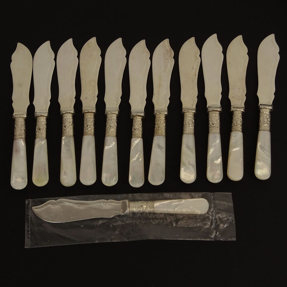Twelve (12) Vintage Sheffield Silver Plate and Mother of Pearl Butter Knives.