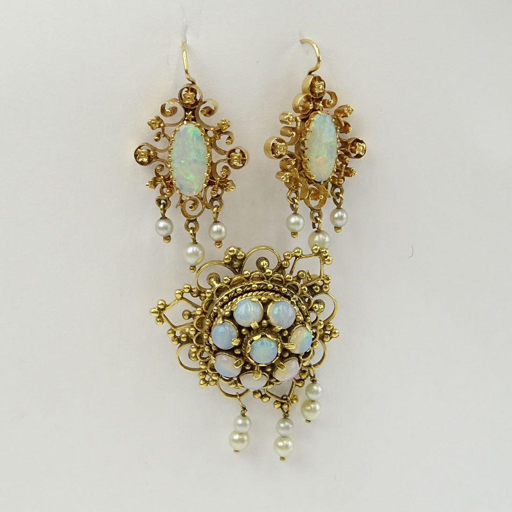 Three Piece Vintage 14 Karat Yellow Gold, Opal and Seed Pearl Suite Including a Pendant/Brooch and a Pair of Earrings.