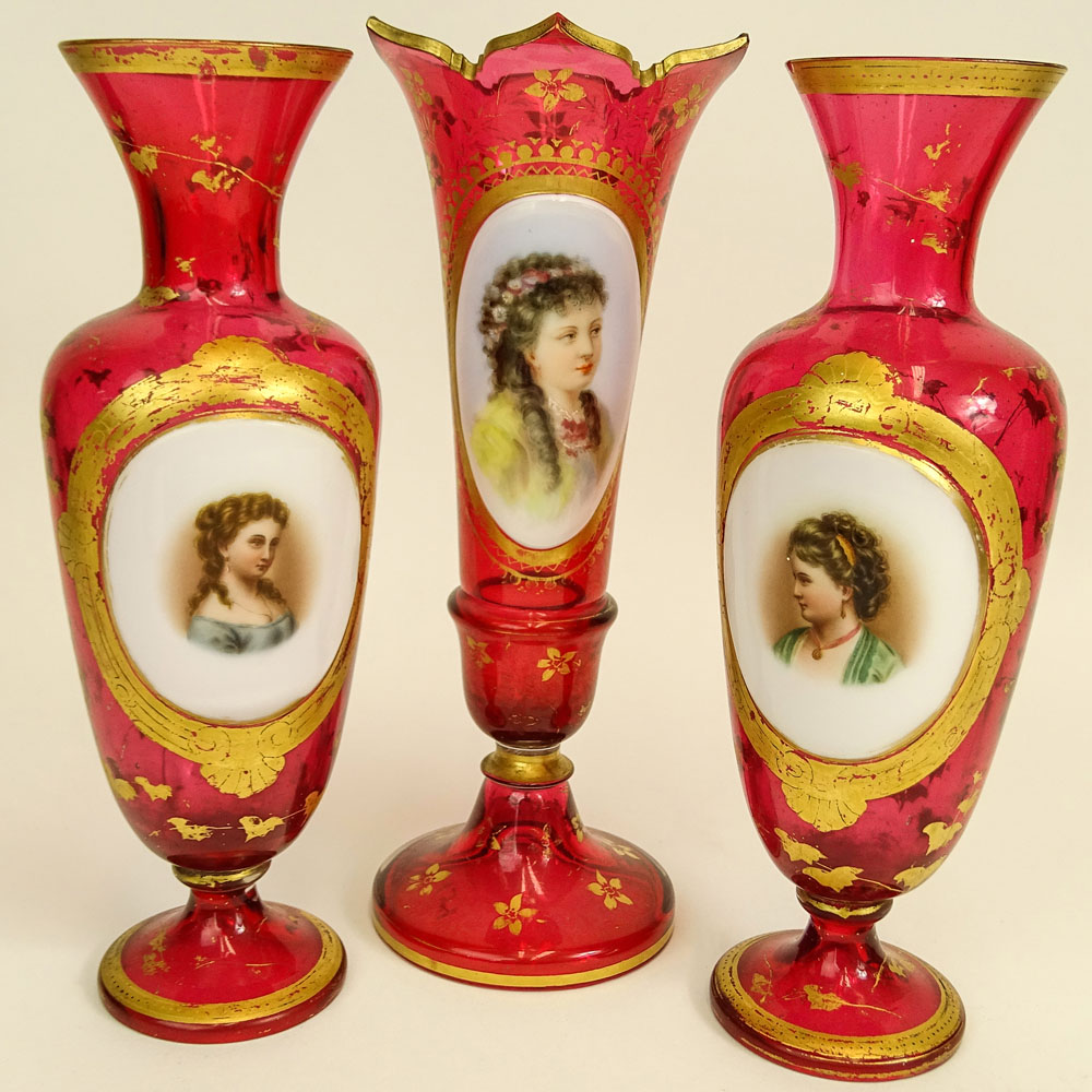 Three (3) Bohemian Cranberry Glass Portrait Vases.