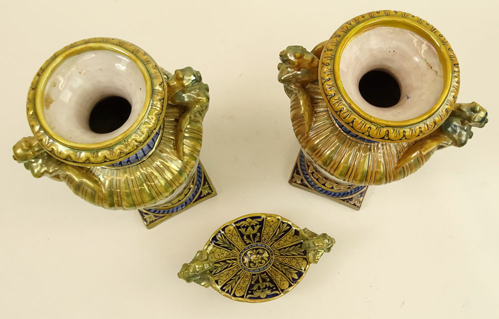 Three Pieces Early 20th Century Robbia Gualdo Tadino Painted Majolica Urns and compote. Chimera handles.