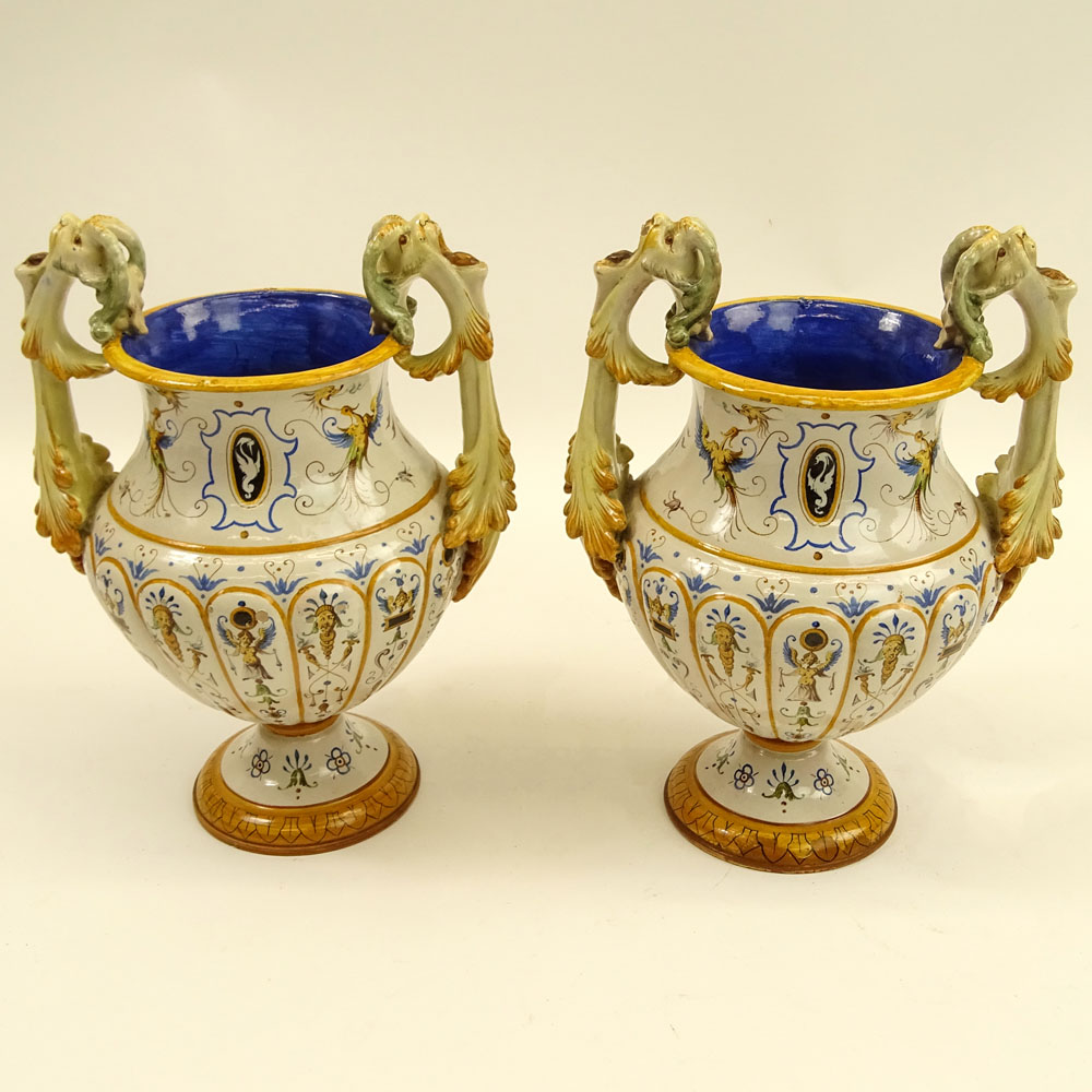 Pair of Antique Ginori Majolica Urns. Chimera handles.