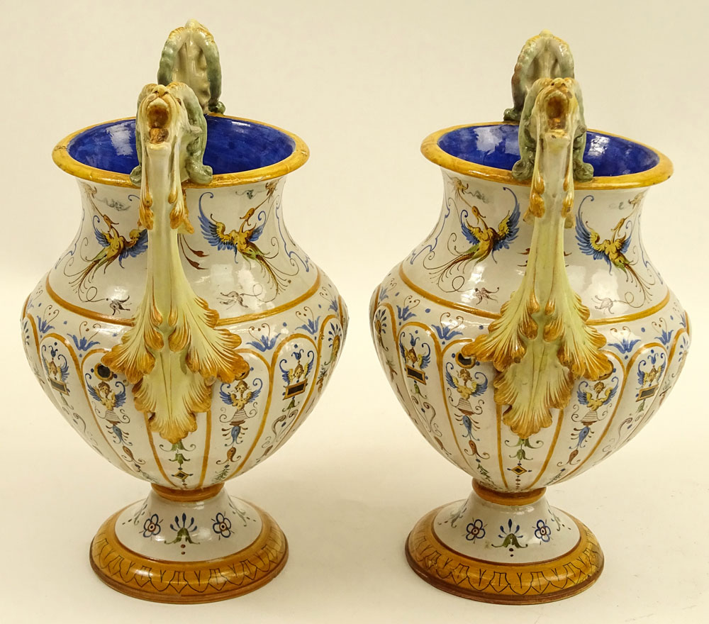 Pair of Antique Ginori Majolica Urns. Chimera handles.