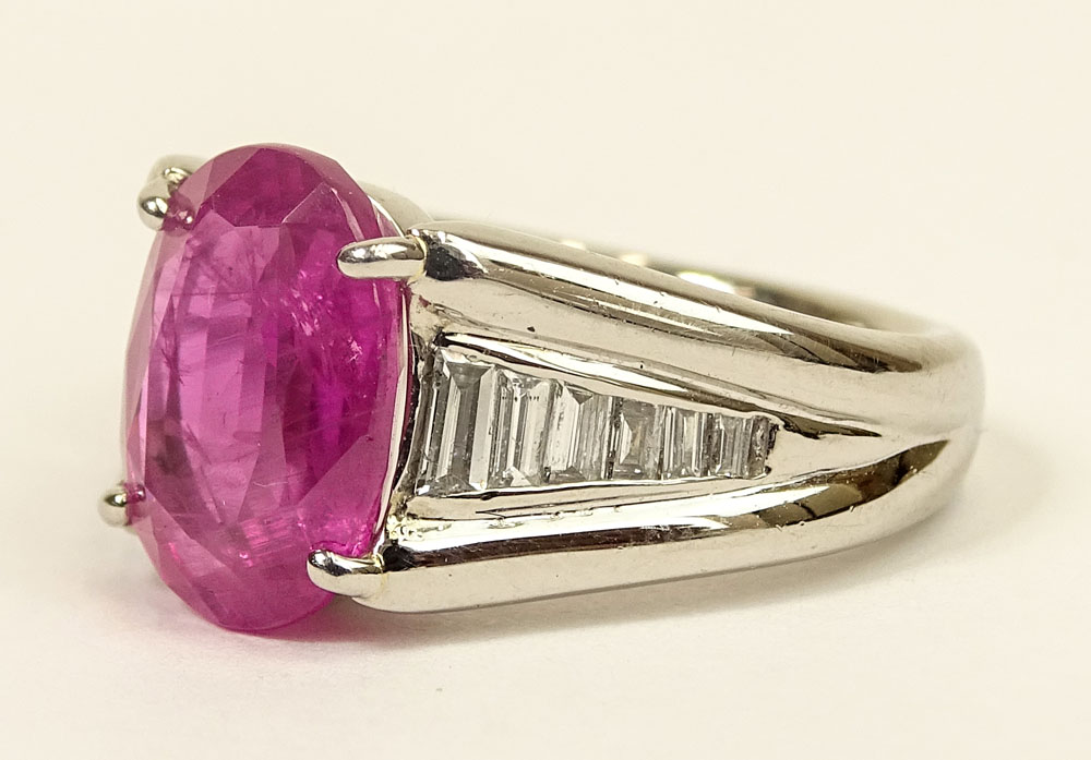 4.92 Carat Oval Cut Burma Ruby, .45 Carat Baguette Cut Diamond and Platinum Ring. 