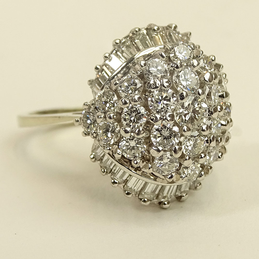 Lady's Vintage Approx. 3.50 Carat Round Brilliant Cut and Baguette Cut Diamond and 14 Karat White Gold Dome Ring.