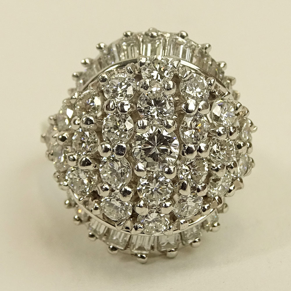 Lady's Vintage Approx. 3.50 Carat Round Brilliant Cut and Baguette Cut Diamond and 14 Karat White Gold Dome Ring.