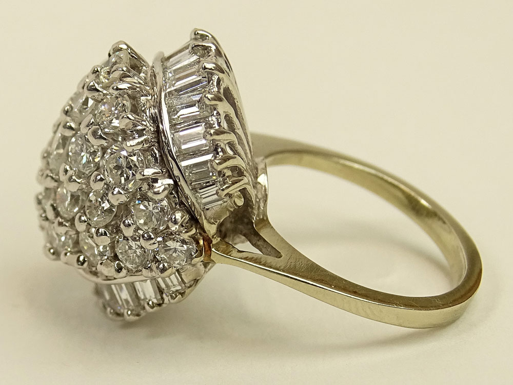 Lady's Vintage Approx. 3.50 Carat Round Brilliant Cut and Baguette Cut Diamond and 14 Karat White Gold Dome Ring.